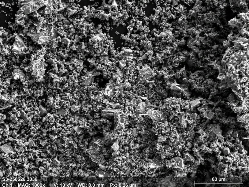 Secondary-electron image of RGS-M1 regolith simulant, 1000x, 10 kV, WD 8.0 mm, scale bar 60 µm